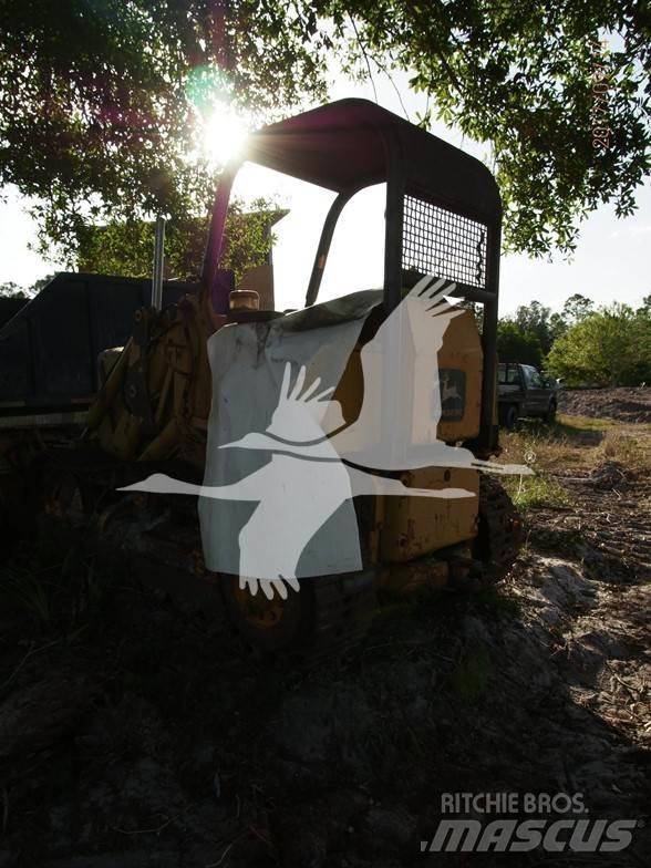 John Deere 450 Pásové nakladače