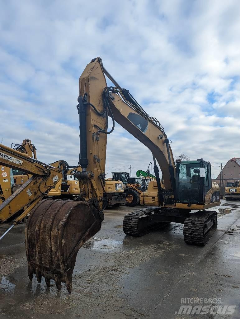 CAT 323 D Pásové rýpadlá