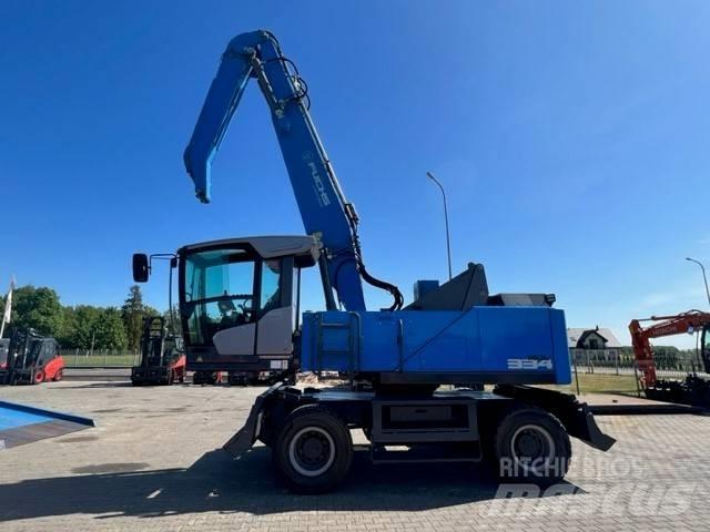 Fuchs MHL 334F Stroje pre manipuláciu s odpadom