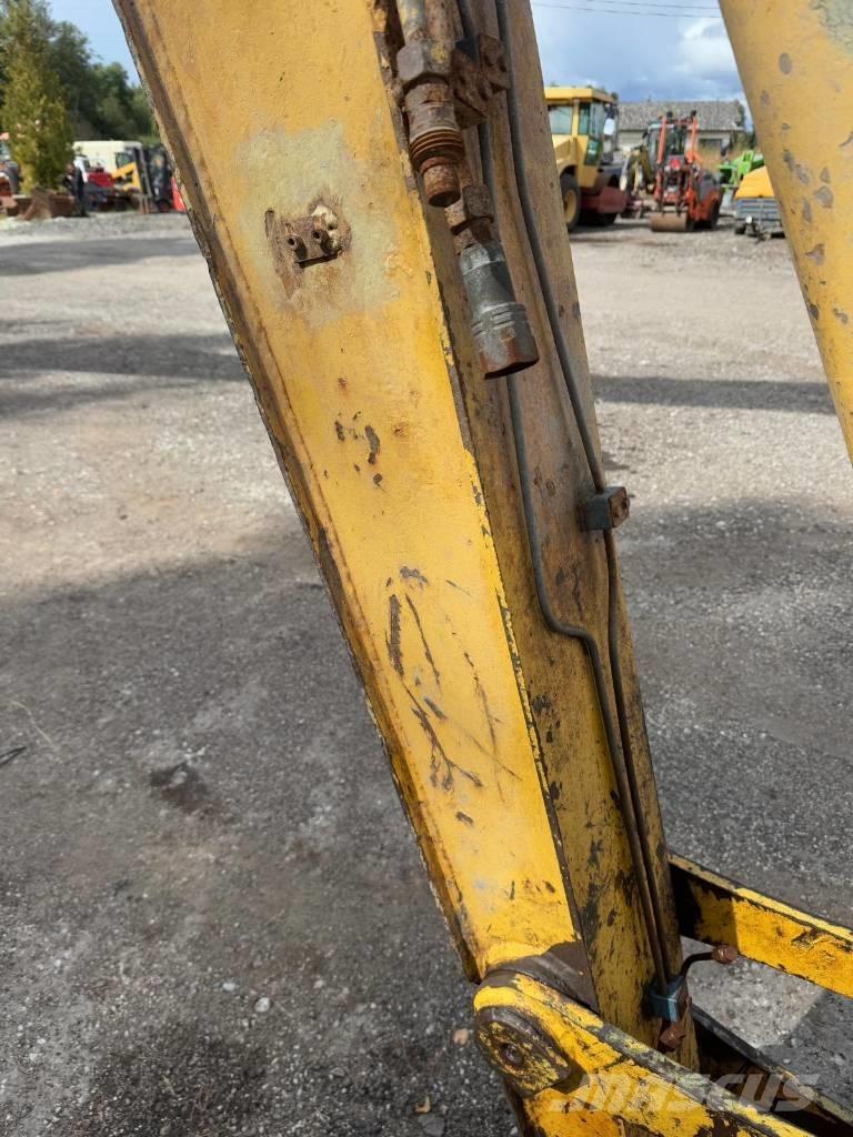 New Holland E 215 Rýpadlá s dlhým dosahom