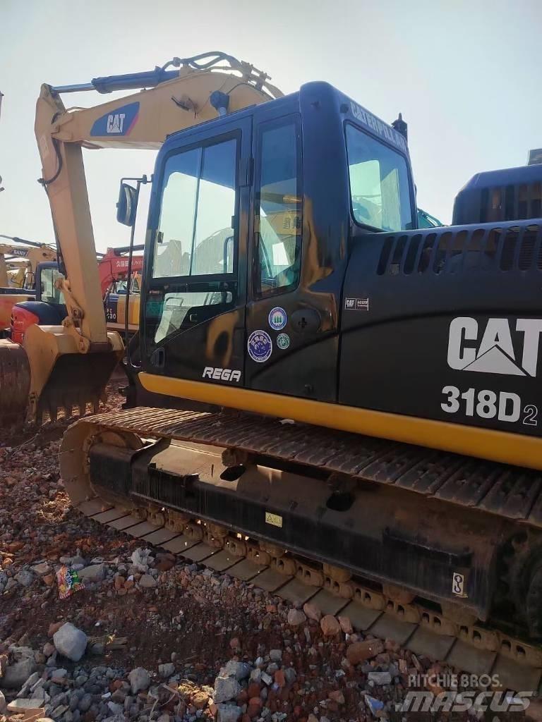CAT 318 Pásové rýpadlá