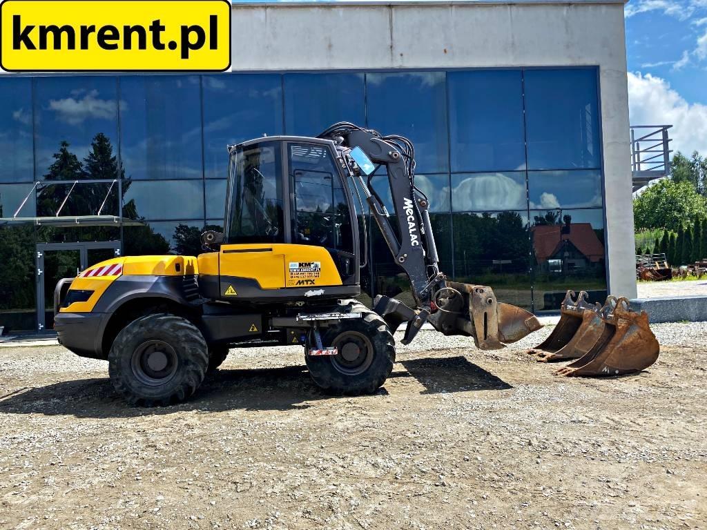 Mecalac 12 M TX Rýpadlo-nakladače