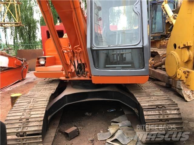 Hitachi EX 100 Pásové rýpadlá