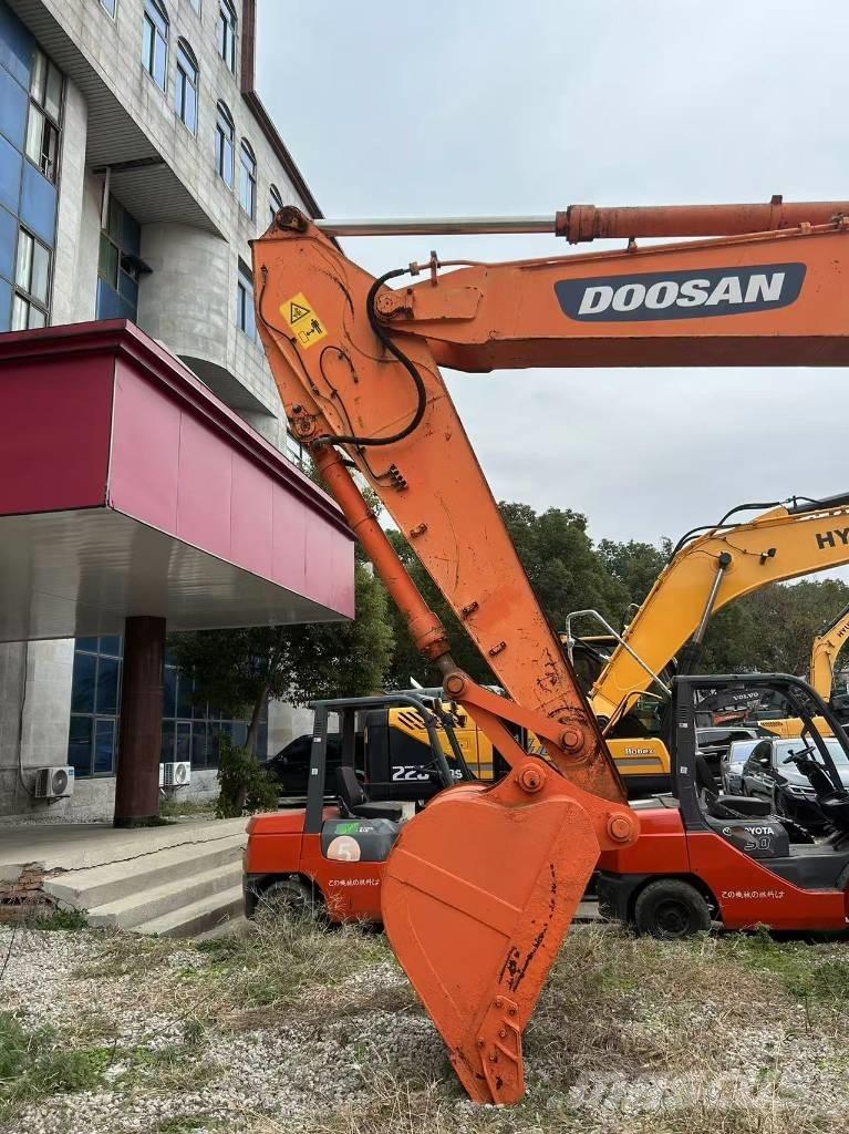 Doosan DH 210 W-7 Kolesové rýpadlá