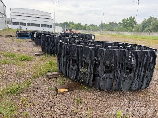CAT 6020 new parts Pásy, reťaze a podvozok