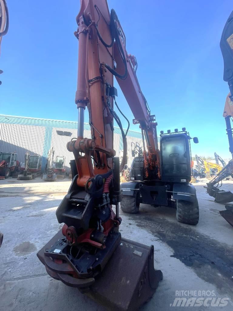 Hitachi 140W-6 Kolesové rýpadlá