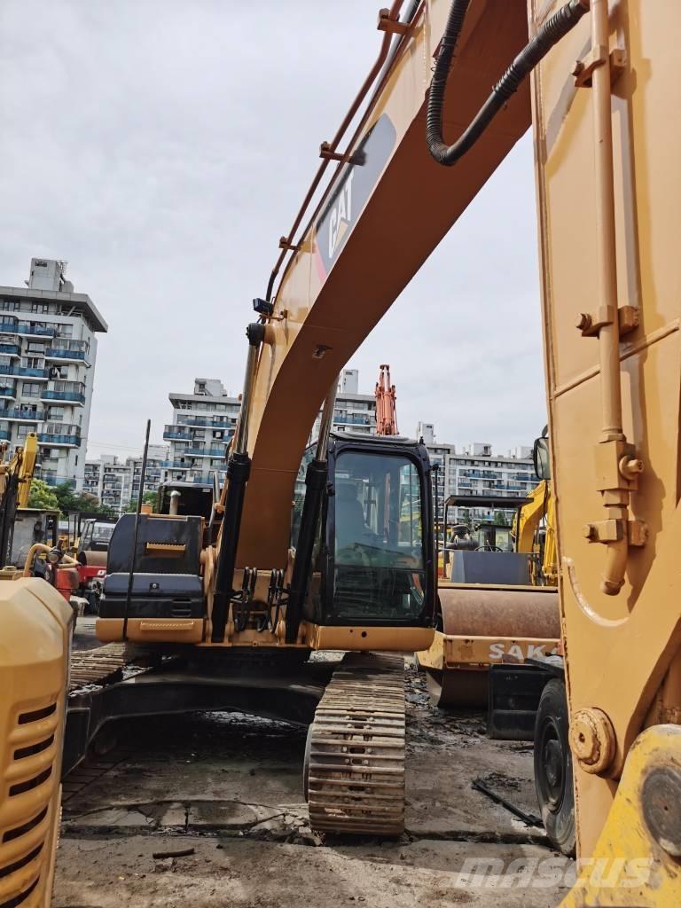 CAT 323D Pásové rýpadlá