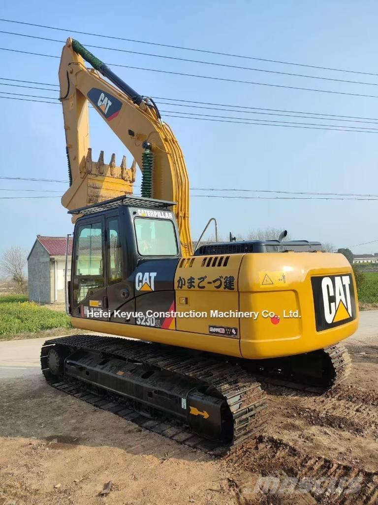 CAT 323 Pásové rýpadlá