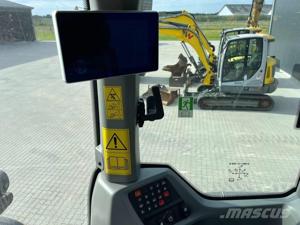 CASE 521 Kolesové nakladače