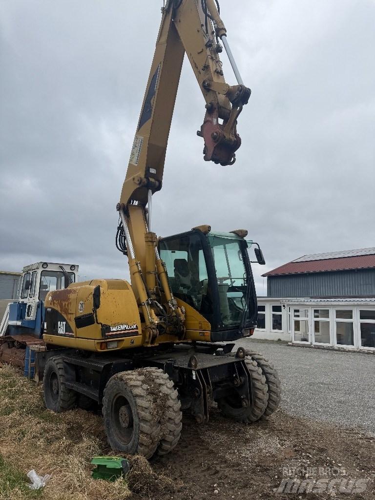CAT M 313 C Kolesové rýpadlá