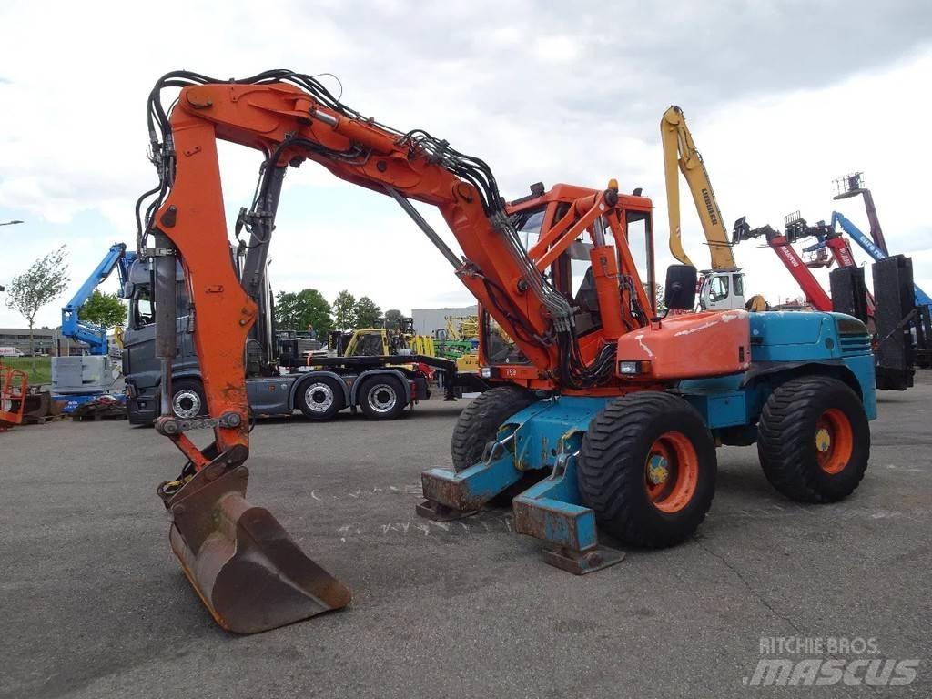Mecalac 12MXT Kolesové rýpadlá