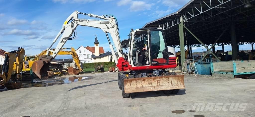 Takeuchi TB 295 W Kolesové rýpadlá