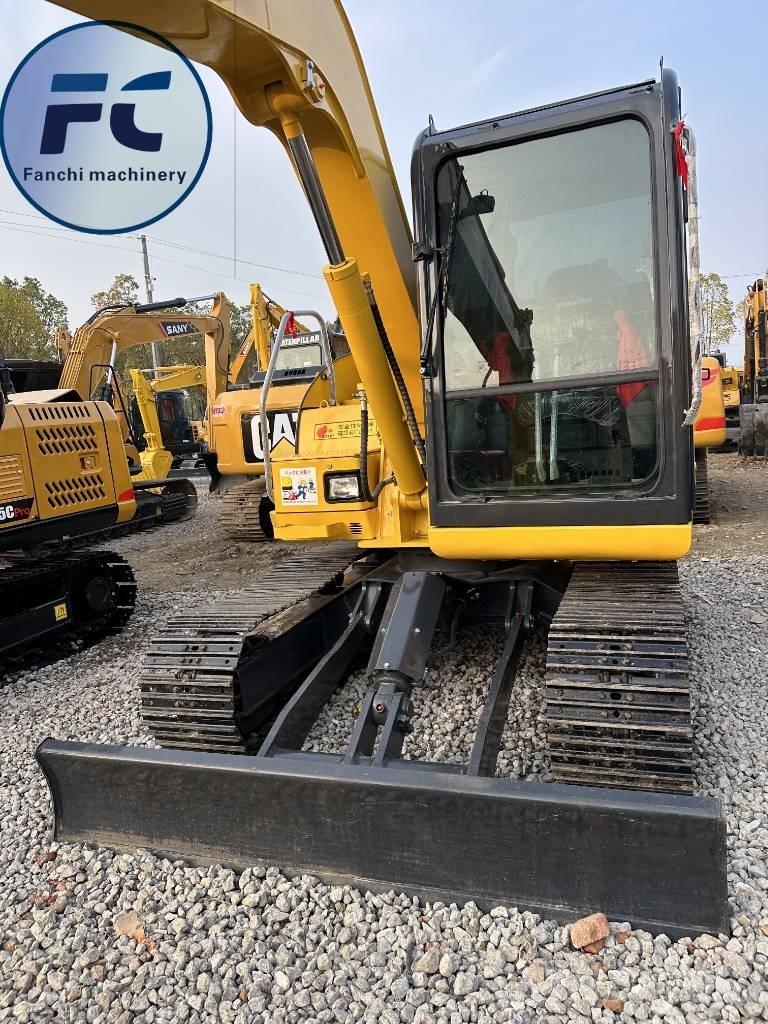 Komatsu 70 Pásové rýpadlá