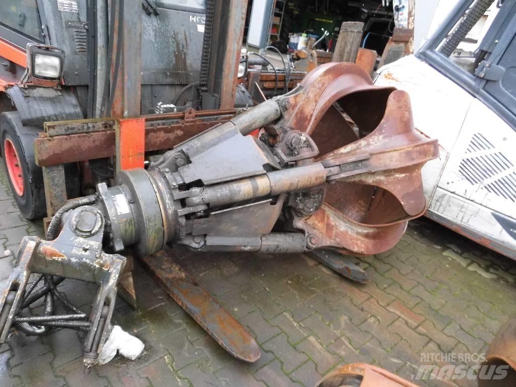 Fuchs MHL 320 Stroje pre manipuláciu s odpadom