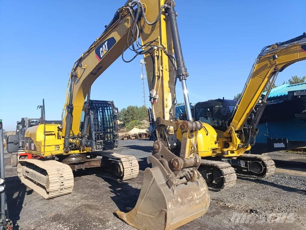 CAT 319D Pásové rýpadlá