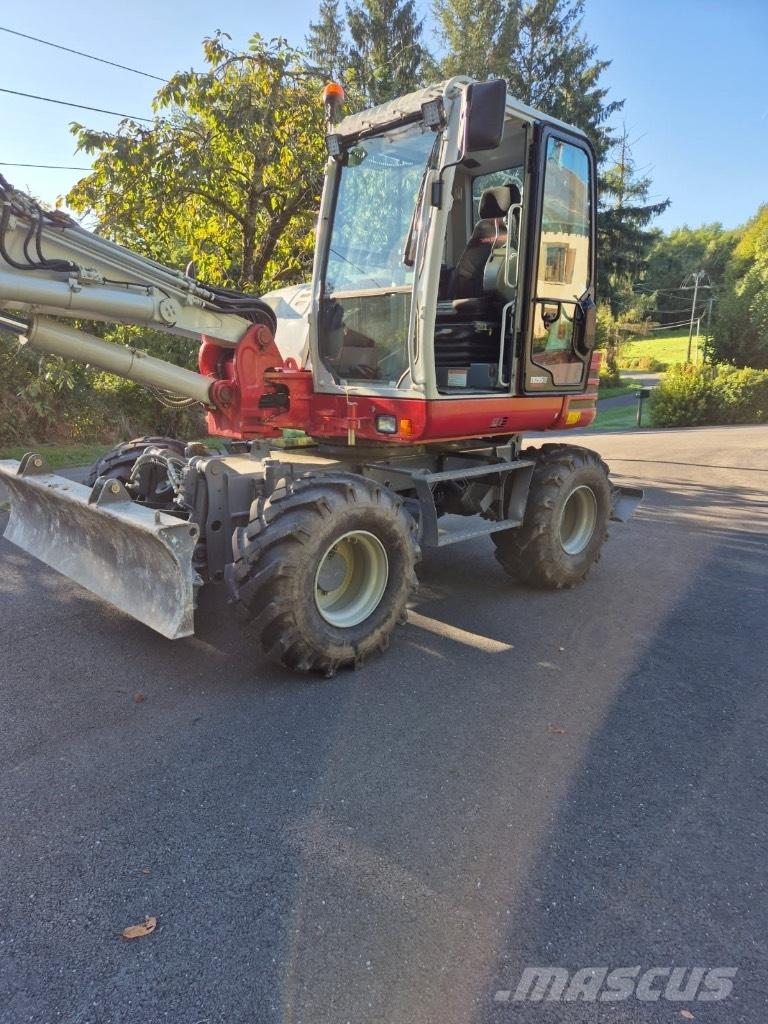 Takeuchi TB 295 W Kolesové rýpadlá