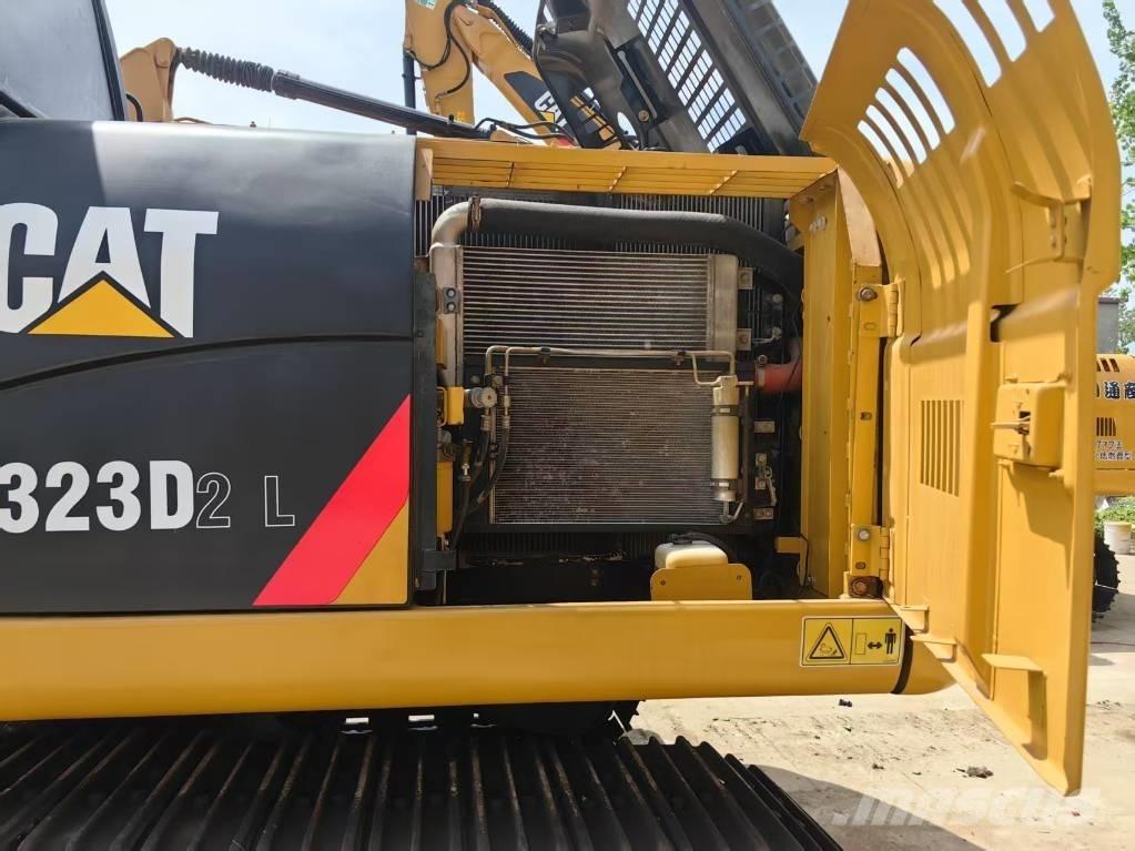 CAT 323 D Pásové rýpadlá