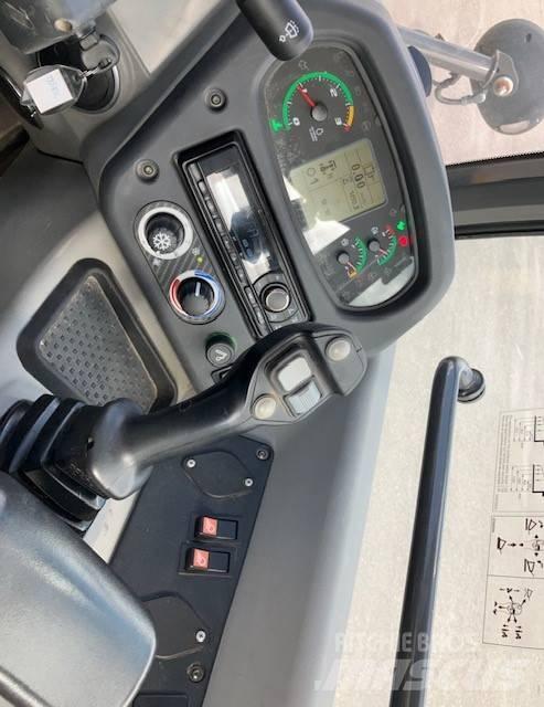 New Holland W70c Kolesové nakladače