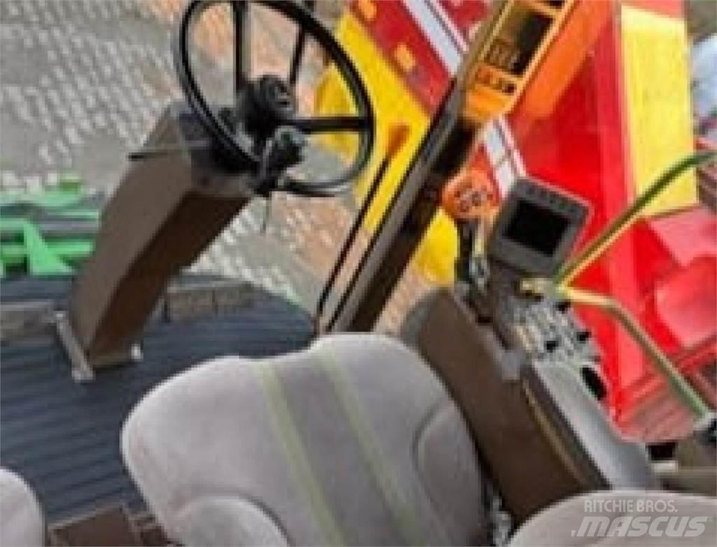 John Deere T560 Kombinované zberacie stroje