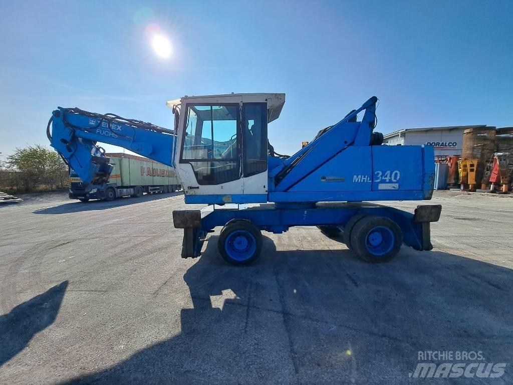 Fuchs MHL  340C FQC Stroje pre manipuláciu s odpadom