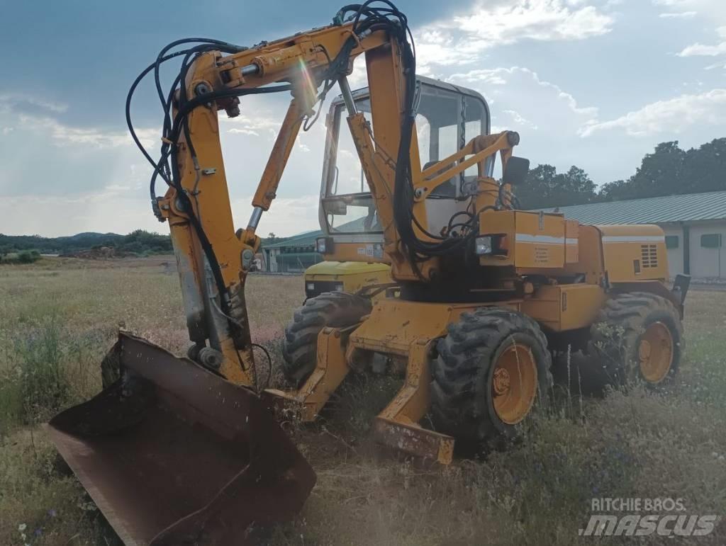 Mecalac 11 CX Kolesové rýpadlá