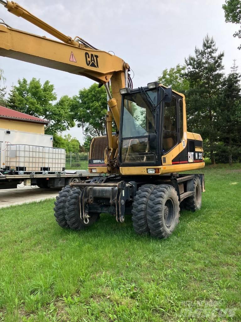 CAT M 312 Kolesové rýpadlá