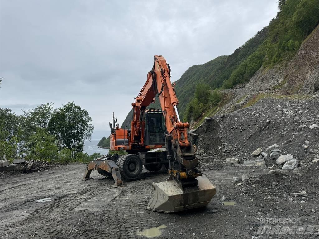 Doosan 140 W Kolesové rýpadlá