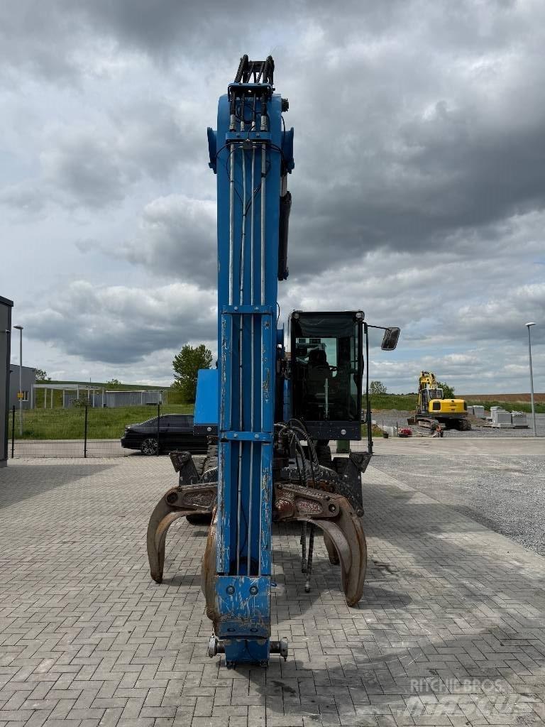 Fuchs MHL 320 Stroje pre manipuláciu s odpadom