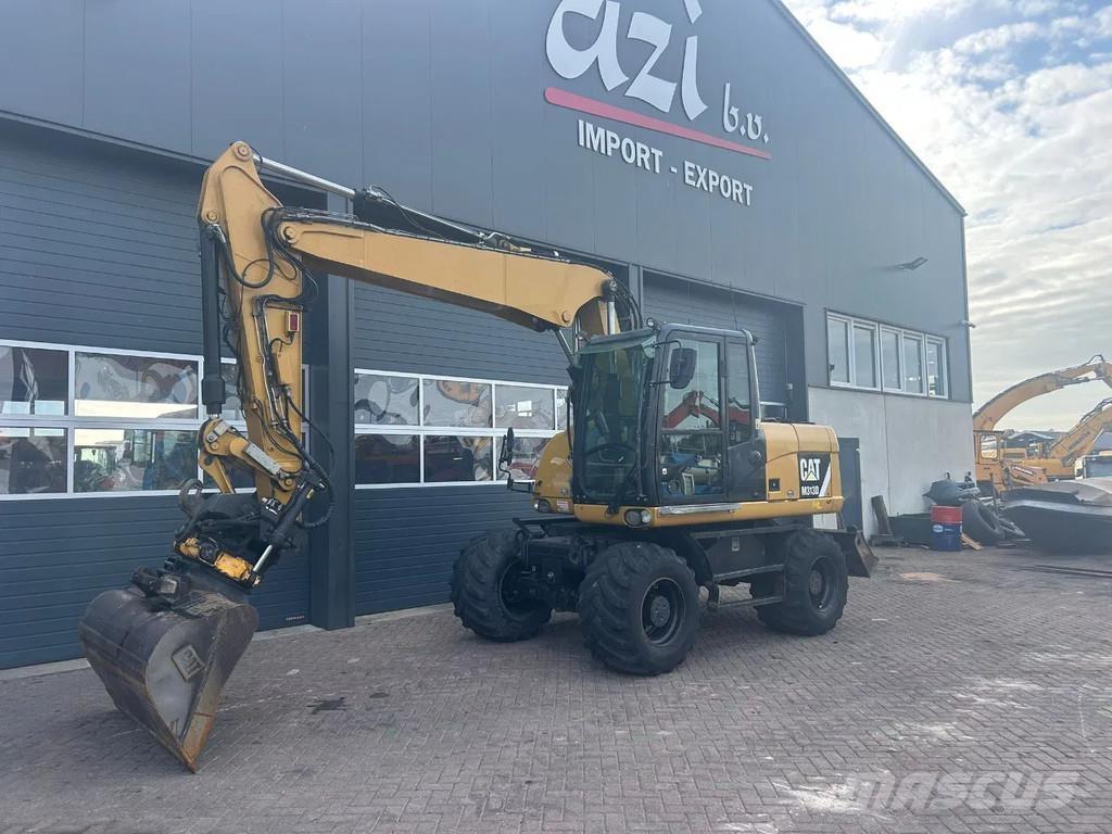 CAT M313D Kolesové rýpadlá