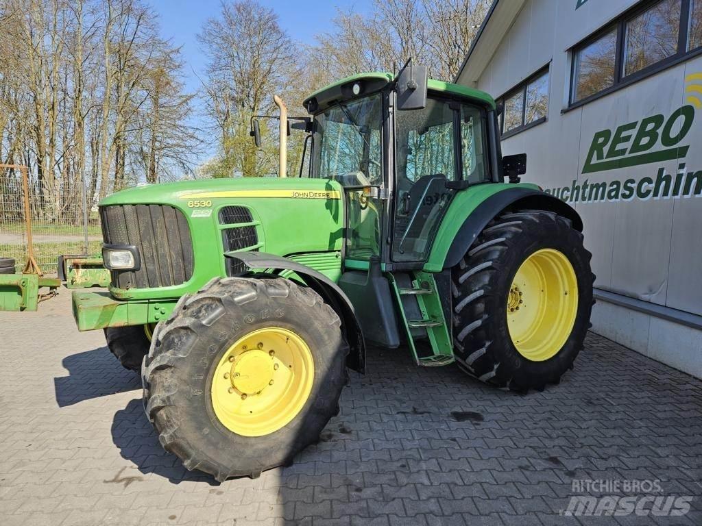 John Deere 6530 Traktory