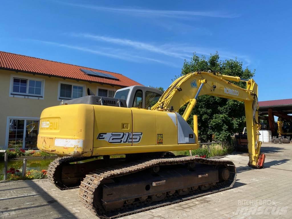 New Holland E 215 Pásové rýpadlá