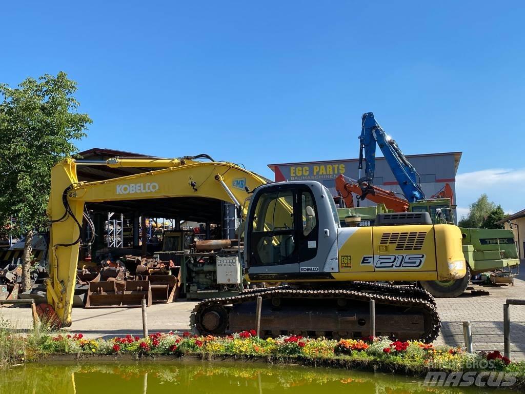 New Holland E 215 Pásové rýpadlá