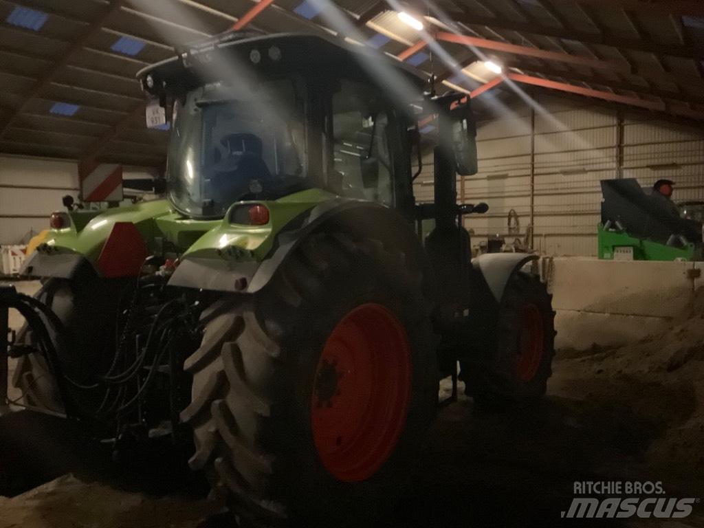 CLAAS ARION 650 cis + Traktory