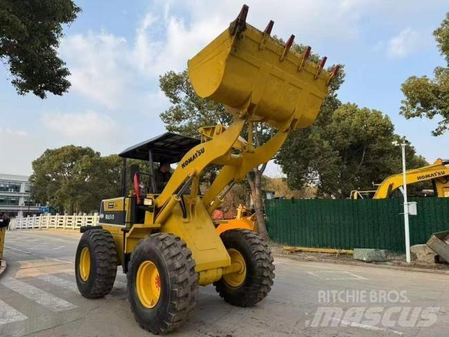 Komatsu WA 100 Kolesové nakladače