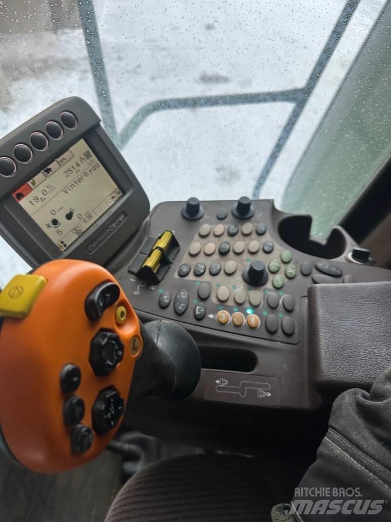 John Deere T550 Kombinované zberacie stroje