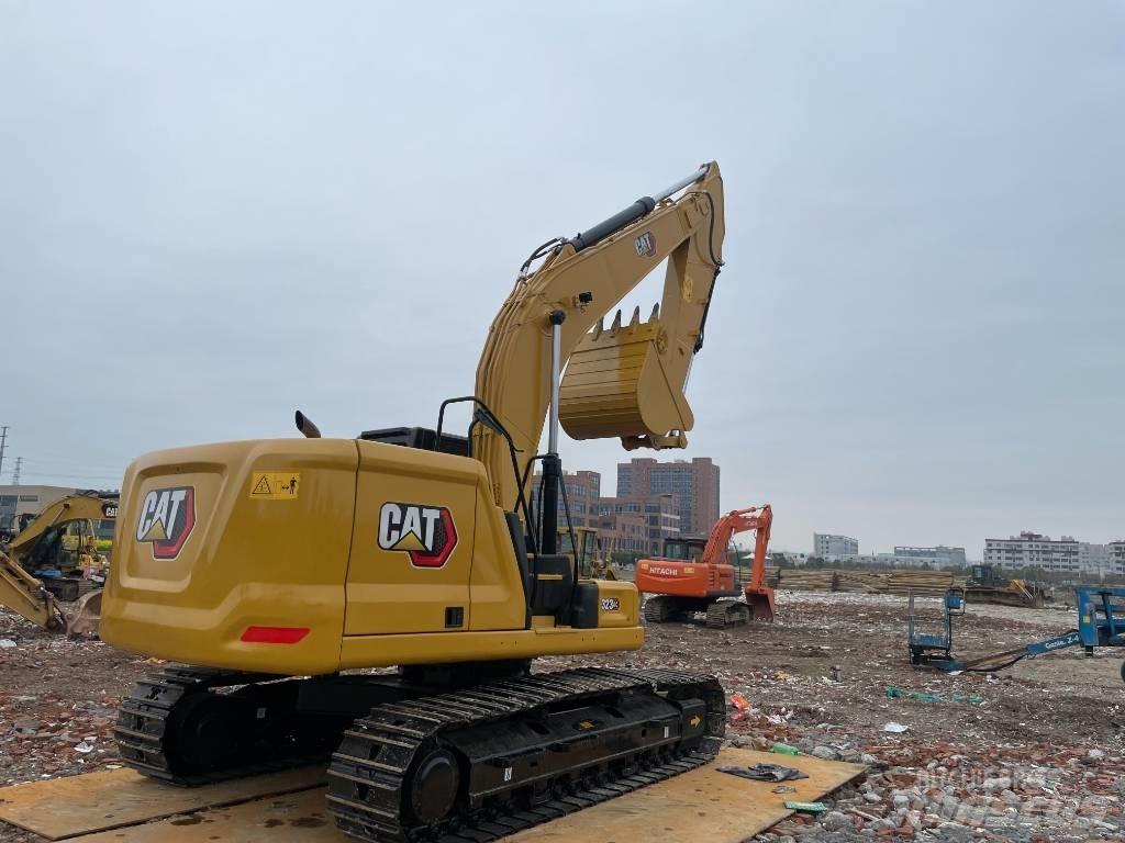 CAT 323GC Pásové rýpadlá