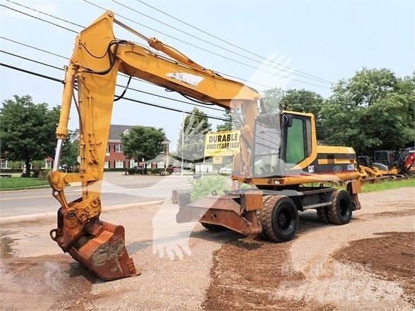 CAT M320 Kolesové rýpadlá
