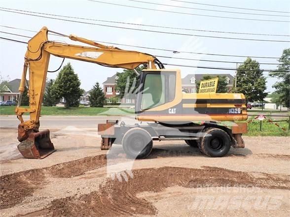 CAT M320 Kolesové rýpadlá