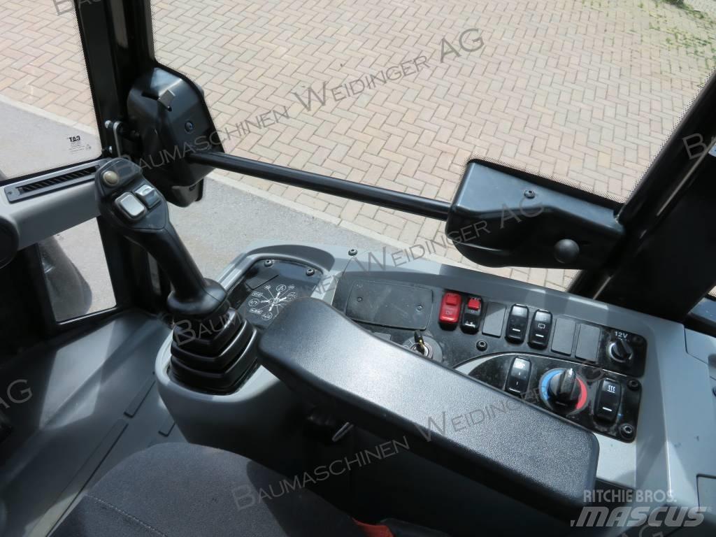 CAT 906M Kolesové nakladače