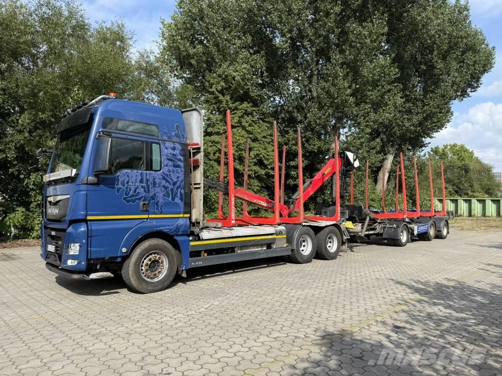 MAN TGX 33.500 Nákladné automobily na prepravu lesných strojov