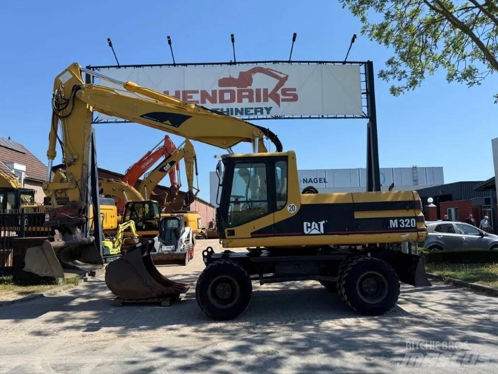 CAT M320 2001 Kolesové rýpadlá