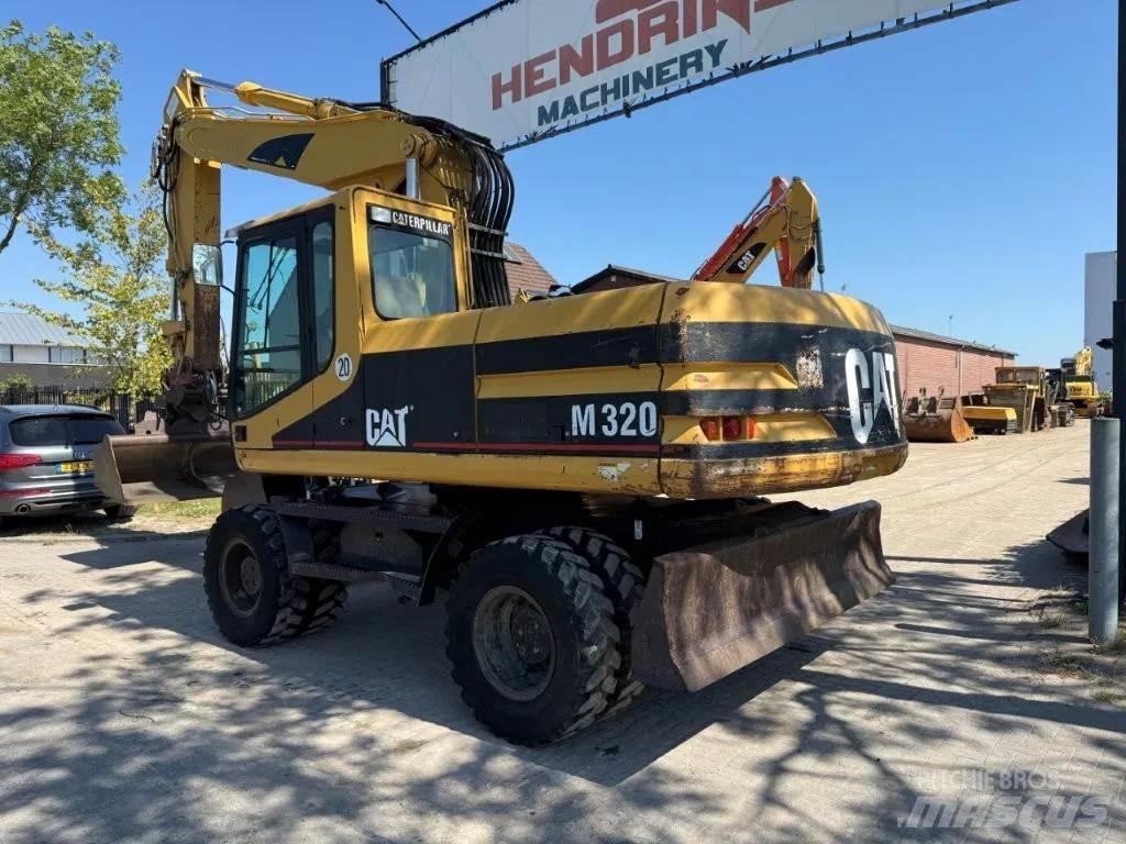 CAT M320 2001 Kolesové rýpadlá