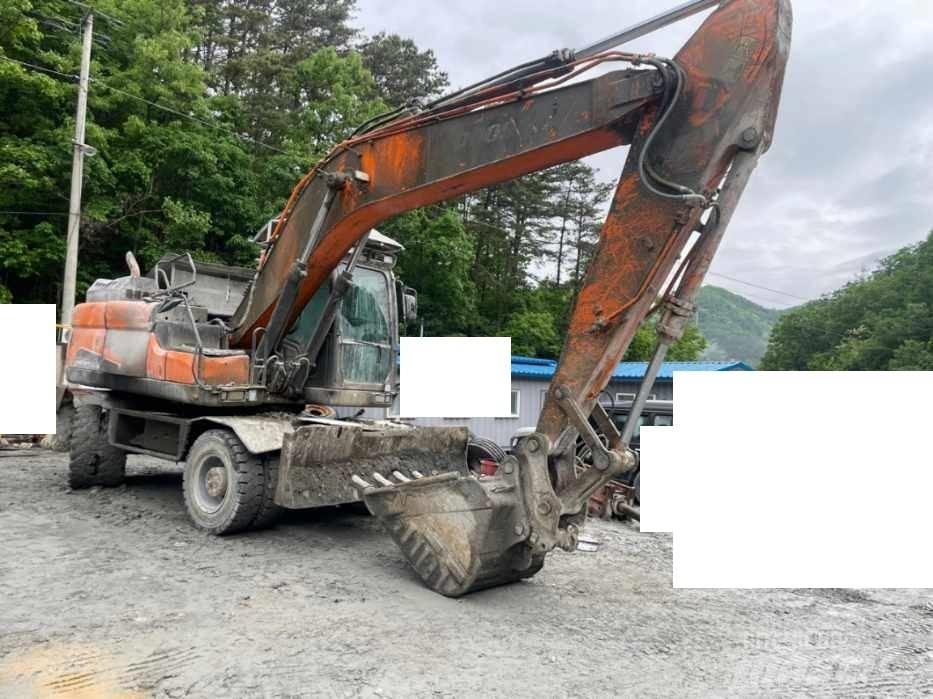 Doosan DX 210 W Kolesové rýpadlá