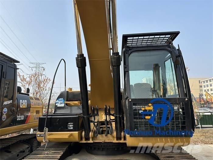 CAT 323D/323/323DL Pásové rýpadlá