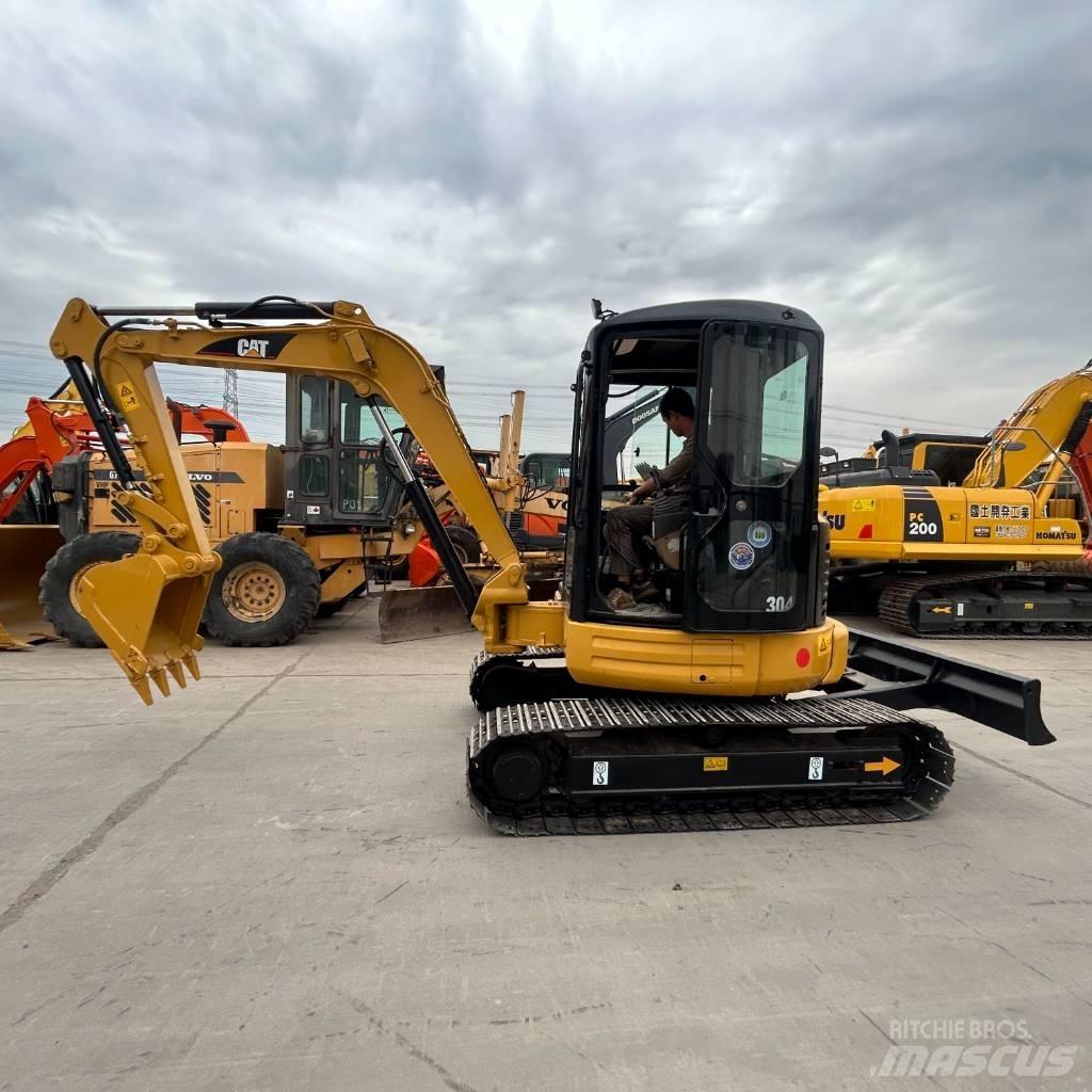 CAT 304 Pásové rýpadlá