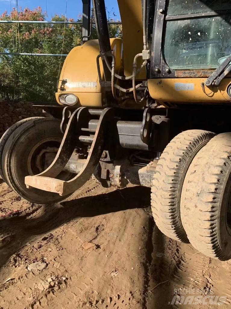 CAT 315 D Kolesové rýpadlá