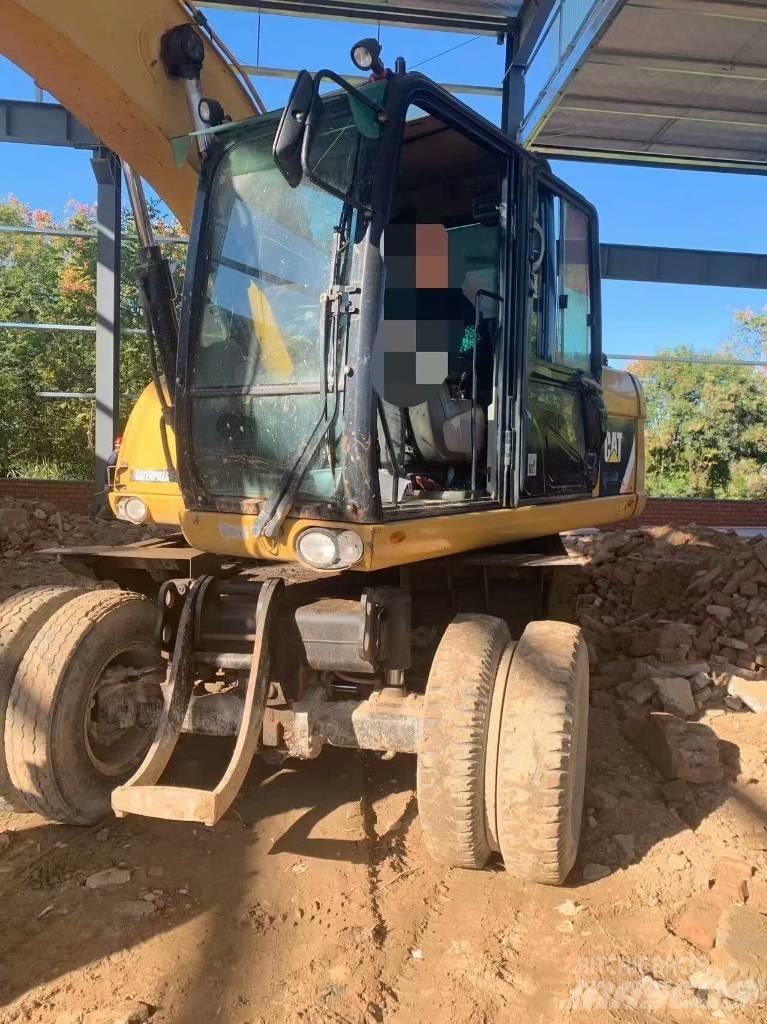 CAT 315 D Kolesové rýpadlá