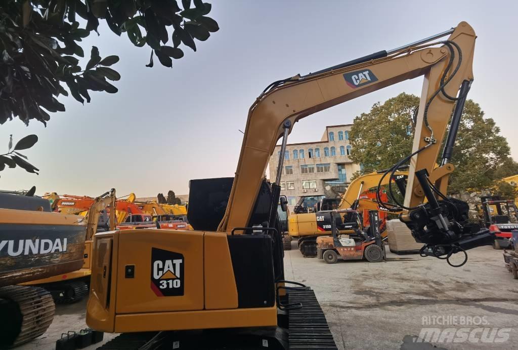 CAT 310 Pásové rýpadlá