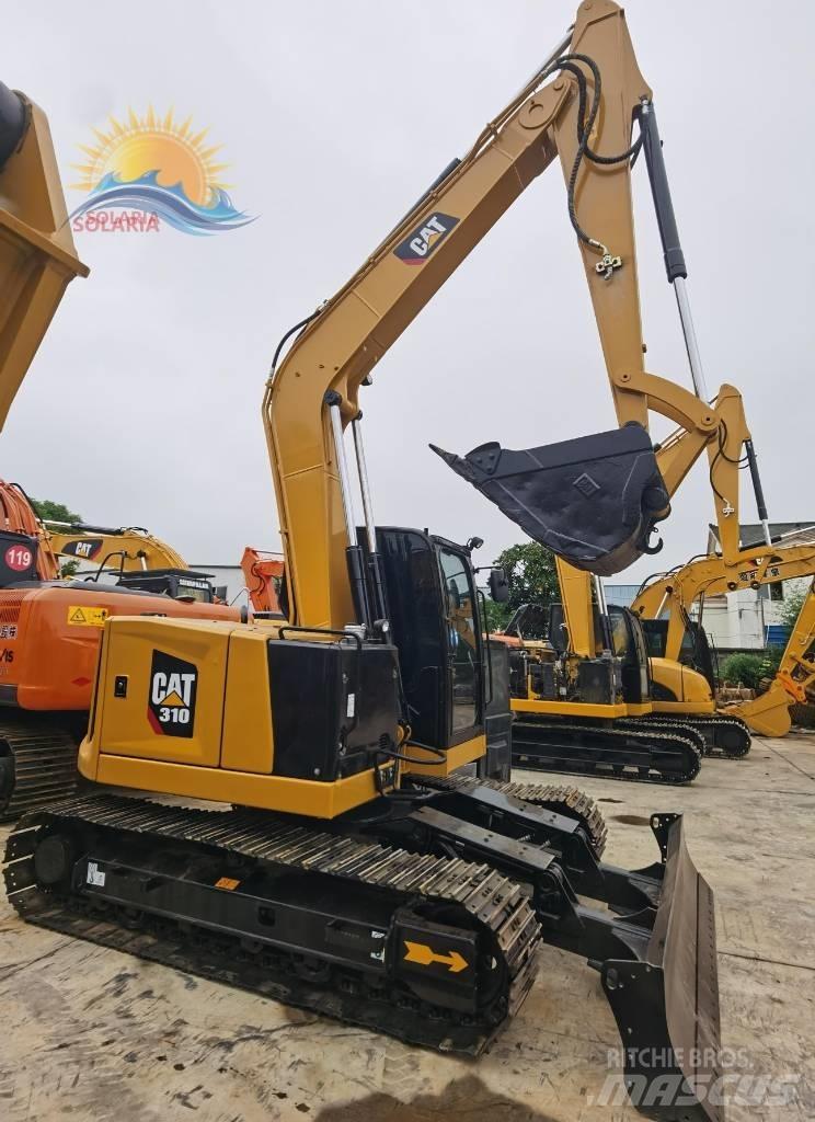 CAT 310 Pásové rýpadlá