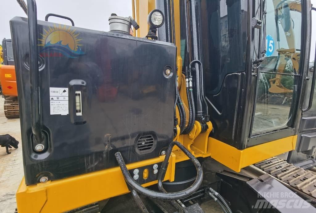 CAT 310 Pásové rýpadlá